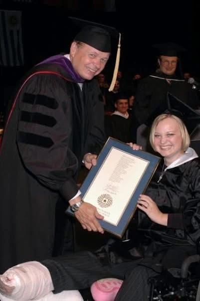 Receiving a diploma at graduation.