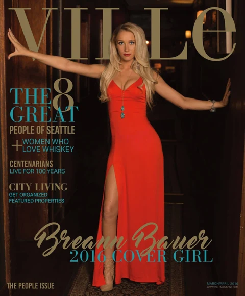 VILLE Magazine cover, The People Issue March/April 2016: Breann Bauer in a red satin gown with a high slit, her arms outstretched touching wood-paneled doorframes, gold "Breann Bauer 2016 Cover Girl" cover line.