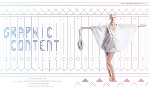 Editorial title spread "GRAPHIC CONTENT" in a faceted geometric font — Katie Joy in a draped off-white tunic with a layered pearl necklace, arms outstretched against an art deco zigzag pattern in soft purple and pink.