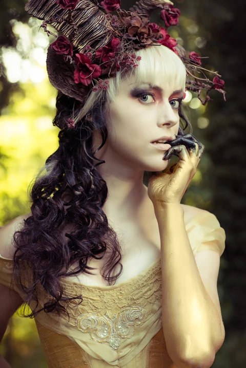 Woodland fantasy beauty portrait with a floral headpiece.
